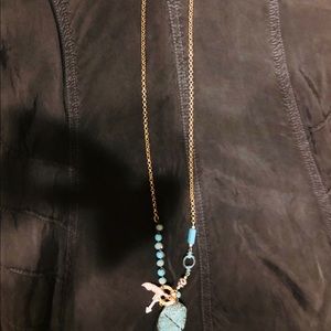 Beautiful turquoise longline necklace with charms